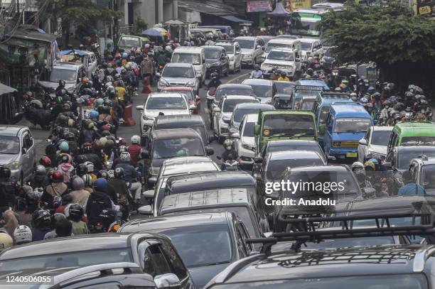 Thousands of motorcyclists crowded Jalan Raya Puncak during the Eid al-Fitr holiday in Bogor, West Java, Indonesia on May 7, 2022. This congestion...