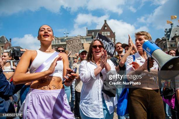 People are clapping after a speech pro abortion, during a demonstration in solidarity for the right to abortion in the USA, organized in Amsterdam,...