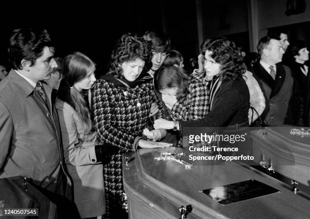The family of John Young a 17 year-old victim of Bloody Sunday beside his coffin prior to his funeral at St Mary's Catholic Church in Londonderry...