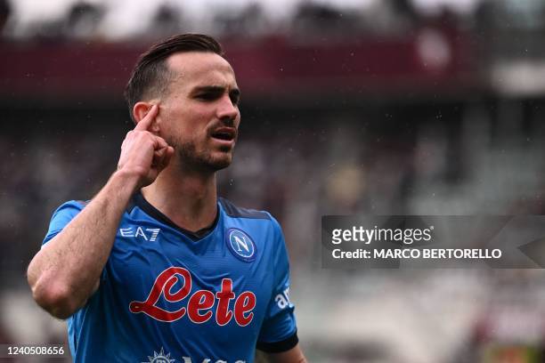 Napoli's Spanish midfielder Fabian Ruiz celebrates after opening the scoring during the Italian Serie A football match between Torino and Napoli on...