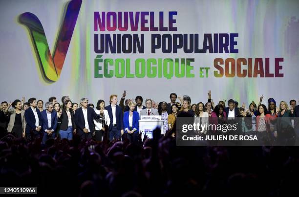 French leftist movement La France Insoumise's leader and three times presidential candidate Jean-Luc Melenchon stands after delivering a speech next...