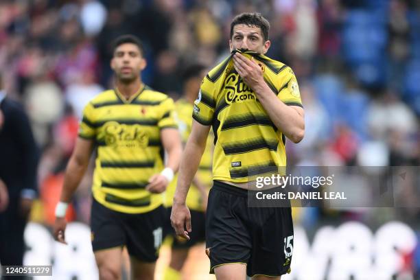 Watford's Northern Irish defender Craig Cathcart reacts after the English Premier League football match between Crystal Palace and Watford at...