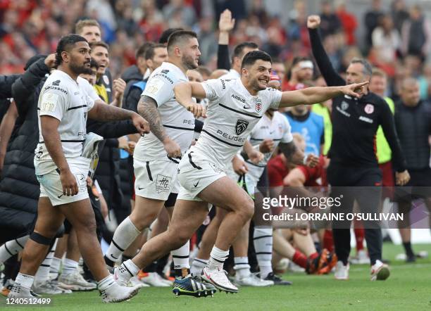 Toulouse players celebrate after winning the penalty shoot-out after the European Champions Cup quarter-final rugby union match between Munster and...