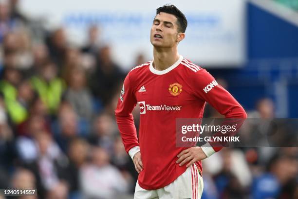 Manchester United's Portuguese striker Cristiano Ronaldo reacts during the English Premier League football match between Brighton and Hove Albion and...