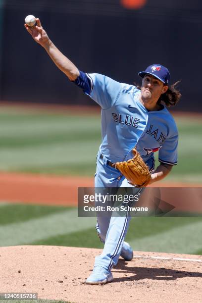 Kevin Gausman of the Toronto Blue Jays pitches against the Cleveland Guardians during the first inning of game one of a doubleheader at Progressive...