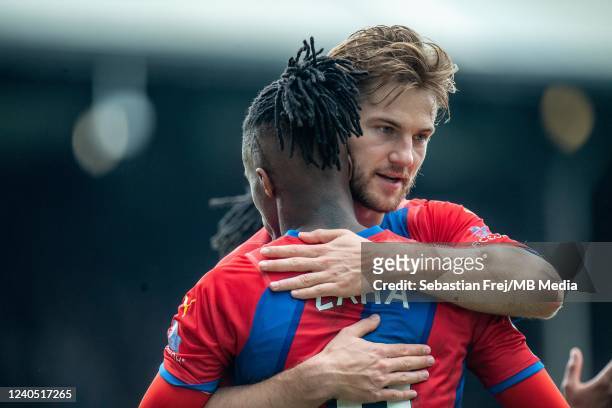 Wilfried Zaha of Crystal Palace celebrates with Joachim Andersen after scoring goal during the Premier League match between Crystal Palace and...