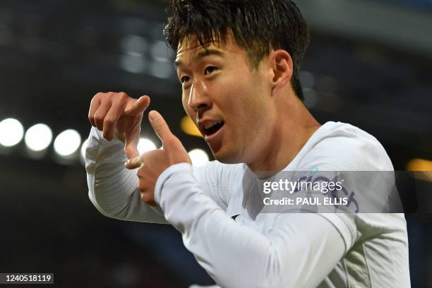 Tottenham Hotspur's South Korean striker Son Heung-Min celebrates after scoring the opening goal of the English Premier League football match between...