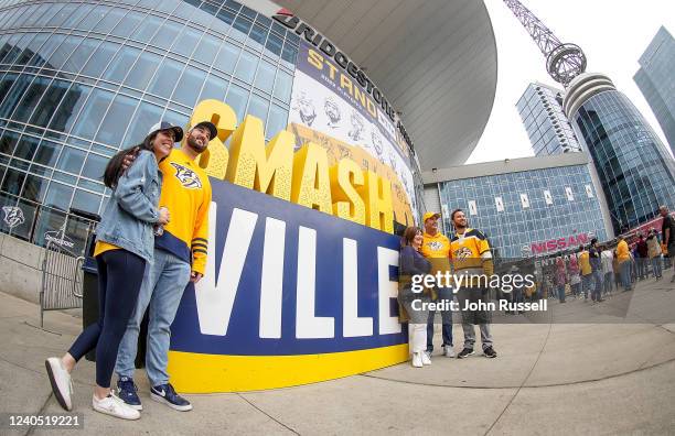 Hockey fans arrive for Game Three of the First Round of the 2022 Stanley Cup Playoffs between the Nashville Predators and the Colorado Avalanche at...