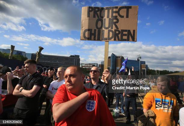 Supporters of Tommy Robinson and his child grooming documentaries watch the screening on May 7, 2022 in Telford, England. After marching to the city...