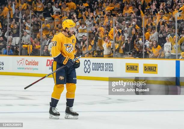Roman Josi of the Nashville Predators celebrates his goal against the Colorado Avalanche in Game Three of the First Round of the 2022 Stanley Cup...