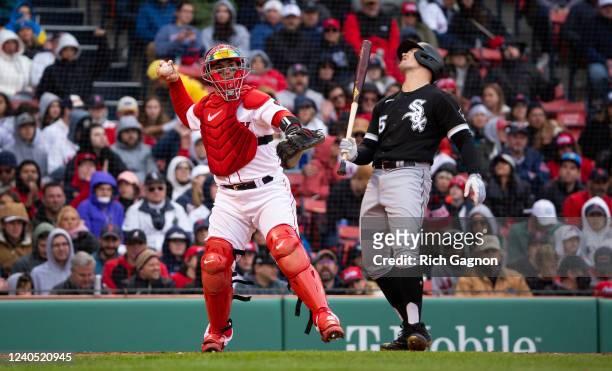 Christian Vazquez of the Boston Red Sox throws the ball to first base after Adam Engel of the Chicago White Sox struck out during the seventh inning...