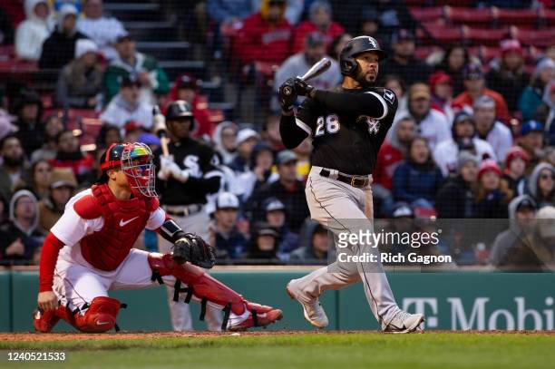 Leury Garcia of the Chicago White Sox drives in a run on a sacrifice fly against the Boston Red Sox during the ninth inning to tie the game 1-1 at...