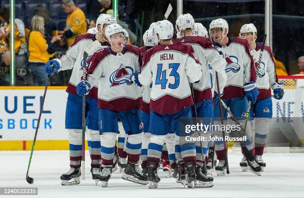 The Colorado Avalanche celebrate a 7-3 win against the Nashville Predators in Game Three of the First Round of the 2022 Stanley Cup Playoffs at...
