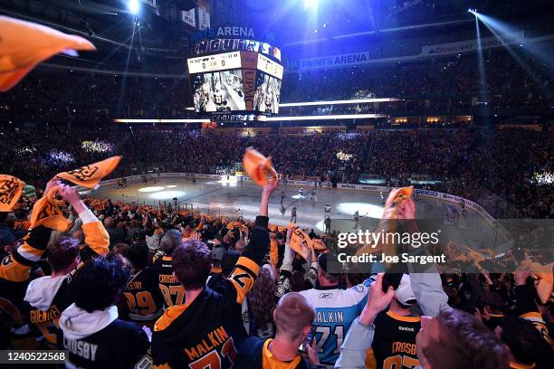 Pittsburgh Penguins cheer before the game against the New York Rangers in Game Three of the First Round of the 2022 Stanley Cup Playoffs at PPG...