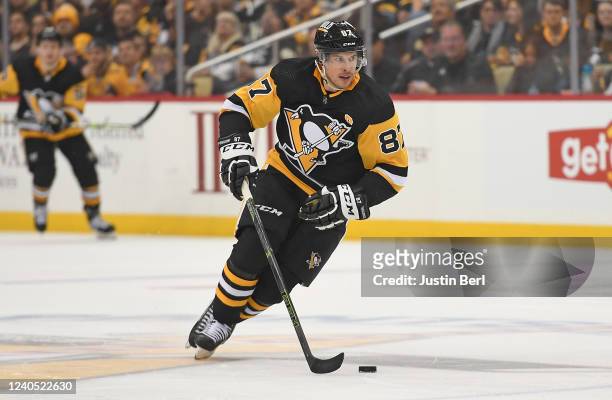 Sidney Crosby of the Pittsburgh Penguins skates with the puck against the New York Rangers during the second period in Game Three of the First Round...