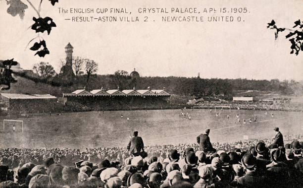 Vintage postcard featuring spectators watching the English FA Cup Final match between Aston Villa and Newcastle United at Crystal Palace in London on...
