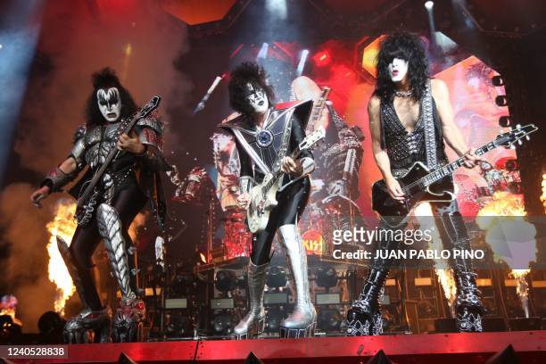 Bass guitarist Tommy Thayer , Gene Simmons and Paul Stanley of US rock band Kiss perform on stage at the Movistar Arena in Bogota on May 7, 2022.