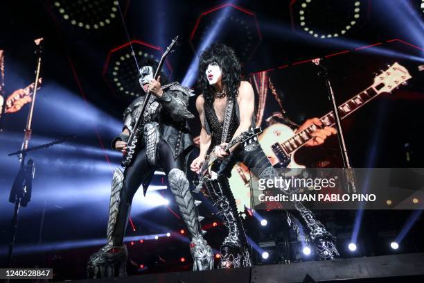 Bass guitarist Tommy Thayer and Paul Stanley of US rock band Kiss perform on stage at the Movistar Arena in Bogota on May 7, 2022.