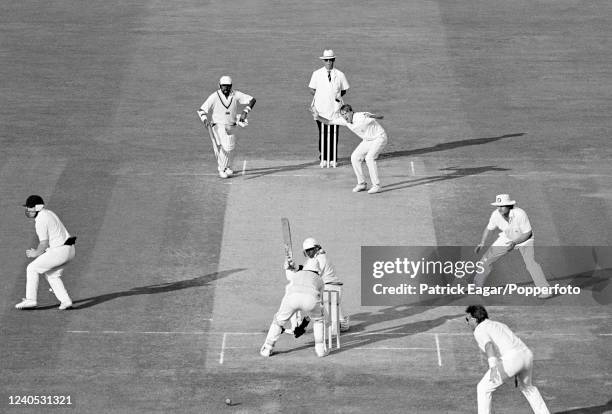 Sri Lanka batsman Aravinda de Silva sweeps the ball past England wicketkeeper Jack Russell off the bowling of Phil Tufnell during the only Test match...