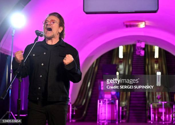 Bono , an Irish singer-songwriter, activist, and the lead vocalist of the rock band U2, performs at subway station which is bomb shelter, in the...