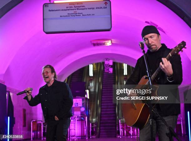 Bono , Irish singer-songwriter, activist, and the lead vocalist of the rock band U2, and guitarist David Howell Evans aka 'The Edge', perform at...