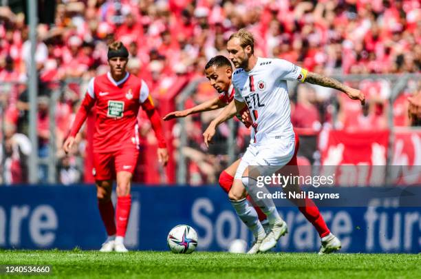 Marcel Risse of Victoria Koeln and Kenny Prince Hassein Redondo of 1.FC Kaiserslautern battles for the ball during the 3. Liga match between Viktoria...