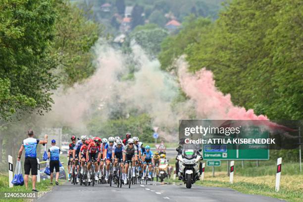 The pack chases a three-men breakaway during the third stage of the Giro d'Italia 2022 cycling race, 201 kilometers between Kaposvar and...