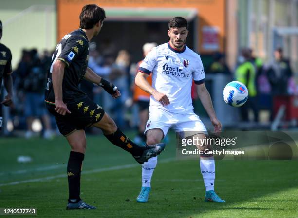 Pietro Ceccaroni of Venezia competes for the ball with Riccardo Orsolini of Bologna during the Serie A match between Venezia FC and Bologna FC at...
