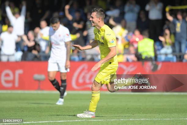 Villarreal's Argentinian midfielder Giovani Lo Celso celebrates after scoring a goal during the Spanish League football between Villarreal CF and...