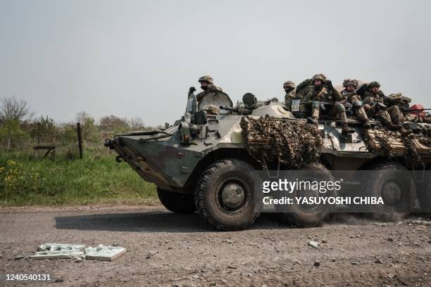 Ukrainian soldiers sit on an armoured Personnel Carrier in Siversk, eastern Ukraine, on May 8 amid the Russian invasion of Ukraine.