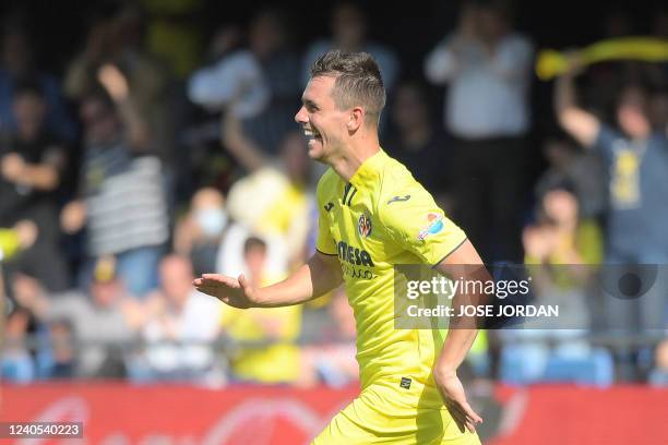 Villarreal's Argentinian midfielder Giovani Lo Celso celebrates after scoring a goal during the Spanish League football between Villarreal CF and...