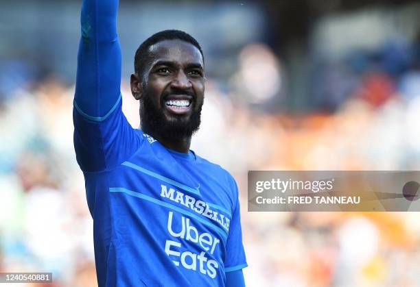 Marseille's Brazilian midfielder Gerson celebrates after scoring during the French L1 football match between Lorient and Olympique de Marseille at...