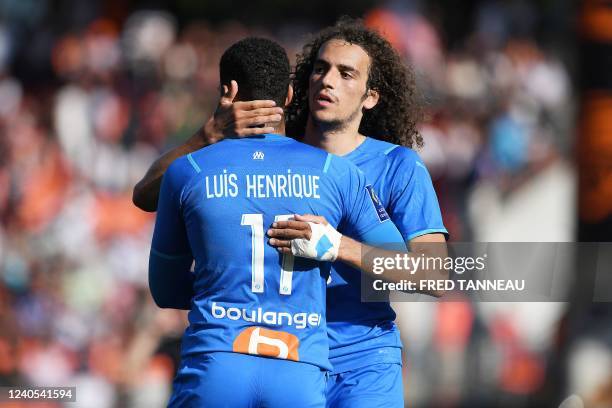 Marseille's French midfielder Matteo Guendouzi and Marseille's Brazilian forward Luis Henrique celebrate at the end of the L1 football match between...