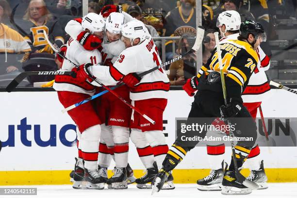 Brett Pesce of the Carolina Hurricanes reacts after scoring a goal against the Boston Bruins in Game Four of the First Round of the 2022 Stanley Cup...