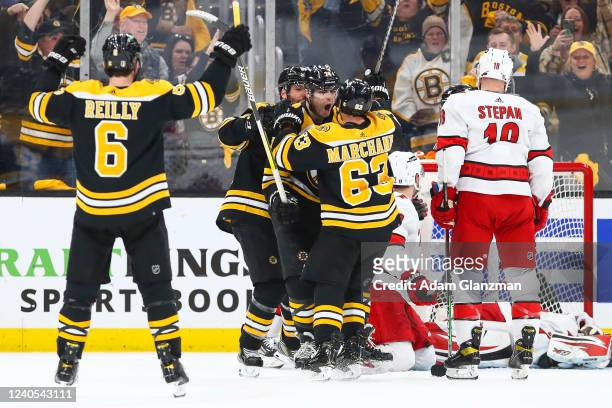 Jake DeBrusk of the Boston Bruins reacts after scoring in the second period against the Carolina Hurricanes in Game Four of the First Round of the...