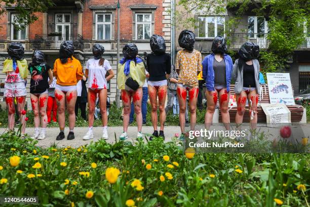 Ukrainian and Polish women attend 'Rape Is a War Crime' protest in front of the Consulate General of Russia in Krakow, Poland on May 8th, 2022. A day...