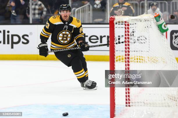 Brad Marchand of the Boston Bruins scores in an open net in the third period against the Carolina Hurricanes in Game Four of the First Round of the...