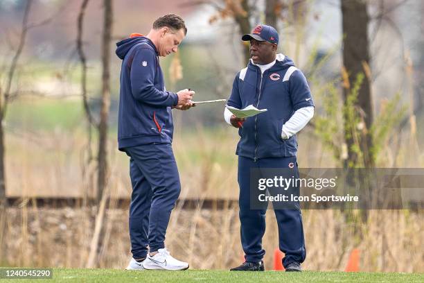 Chicago Bears Head Coach Matt Eberflus and Defensive Coordinator Alan Williams chat during the the Chicago Bears Rookie Minicamp on May 08, 2022 at...