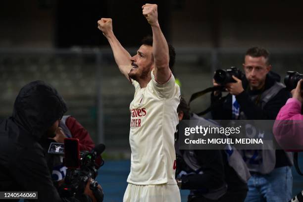 Milan's Italian midfielder Alessandro Florenzi celebrates after scoring during the Italian Serie A football match between Hellas Verona and AC Milan...