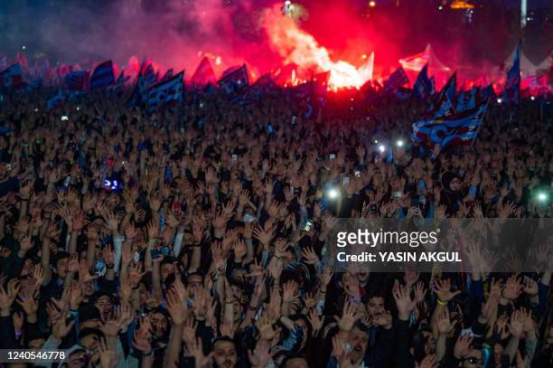Trabzonspor supporters celebrate after winning the Turkish Super Lig championship football title, in Istanbul, on May 8, 2022. - Trabzonspor won the...