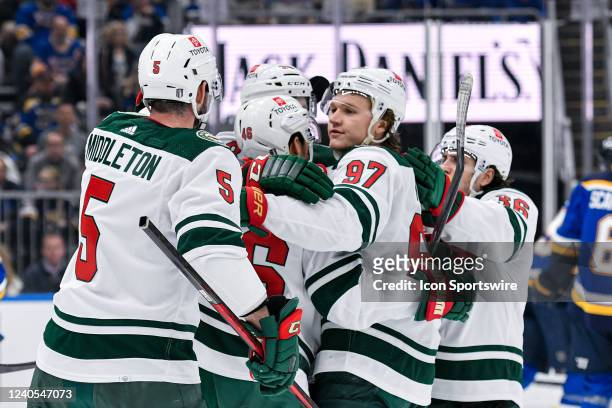 Minnesota players celebrate their goal in the first period tying the game at one during Round 1 game 4 of the Stanley Cup Playoffs between the...
