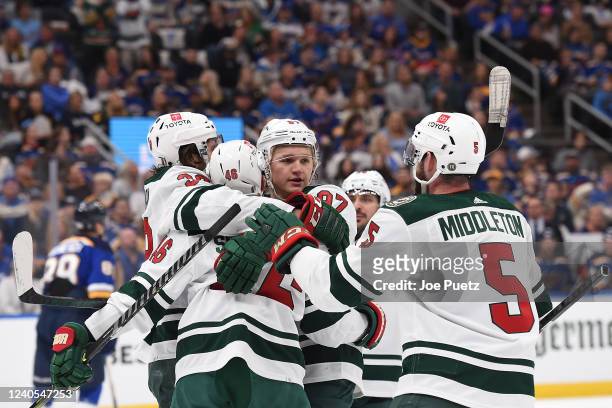 Kirill Kaprizov of the Minnesota Wild is congratulated after scoring a goal against the St. Louis Blues in the first period of Game Four of the First...