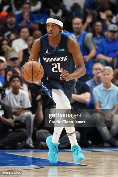 Frank Ntilikina of the Dallas Mavericks dribbles the ball during the game against the Phoenix Suns during Game 4 of the 2022 NBA Playoffs Western...