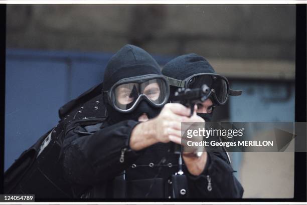 French National SWAT team: RAID In Versailles, France On January 20, 1998 - Exercises in gaining ground under fire for French SWAT team at the...