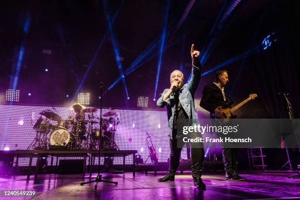 Jim Kerr and Ged Grimes of the British band Simple Minds perform live on stage during a concert at the Columbiahalle on May 8, 2022 in Berlin,...