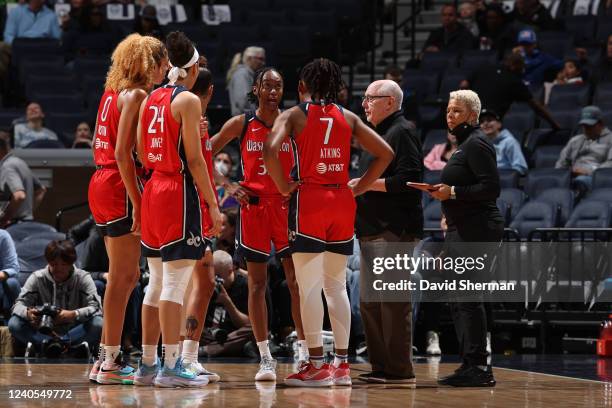 Head Coach Mike Thibault of the Washington Mystics huddles with the team during the game against the Minnesota Lynx on May 8, 2021 at Target Center...