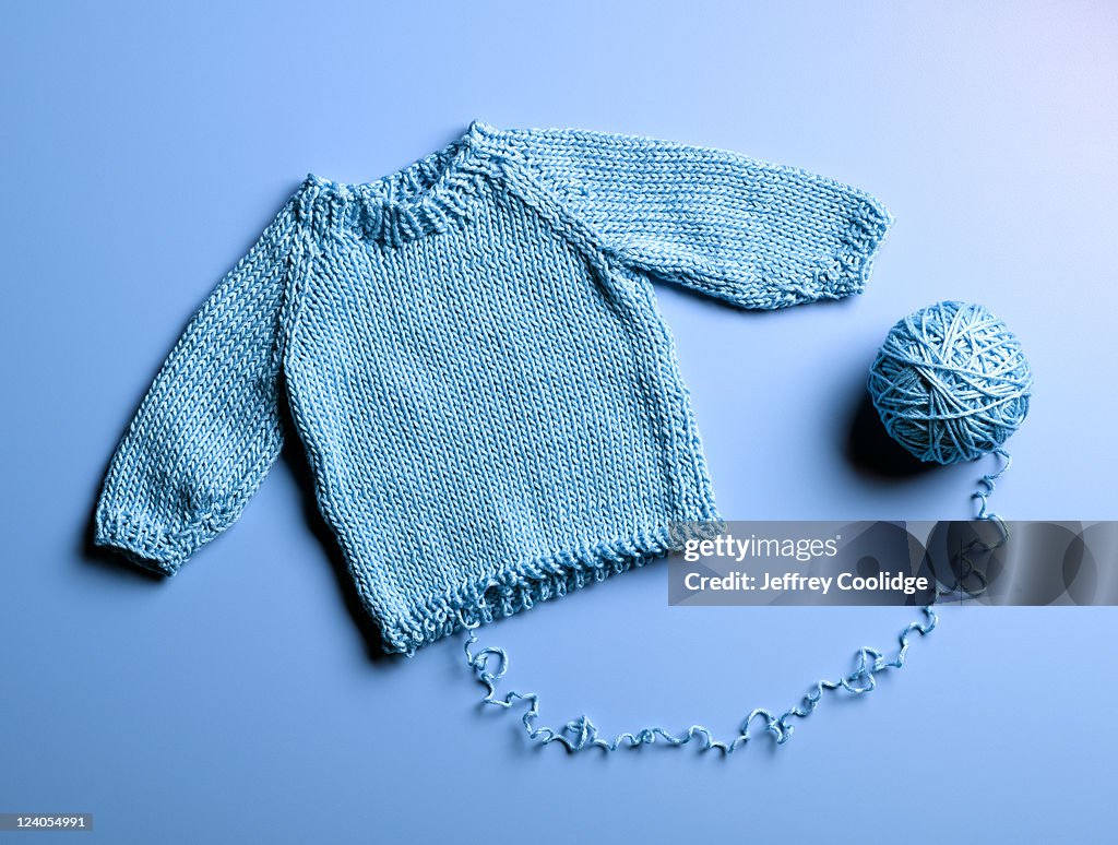 Blue Sweater Unraveling