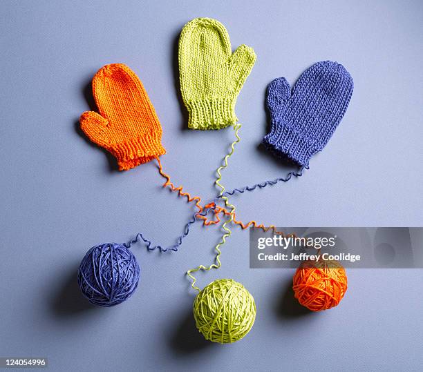 three mittens unraveling - frayed stock pictures, royalty-free photos & images