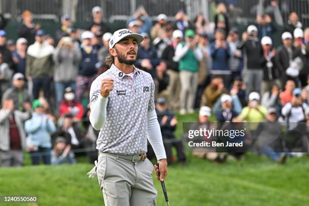 Max Homa fist pumps after making the winning putt on the 18th green during the final round of the Wells Fargo Championship at TPC Potomac at Avenel...