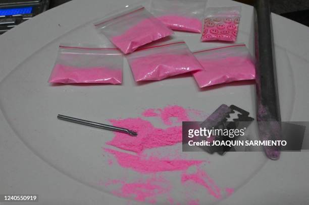 Bags containing a powder known as Tussi or pink cocaine are pictured in Medellin, Colombia, on April 2, 2022. - Three decades after Pablo Escobar's...